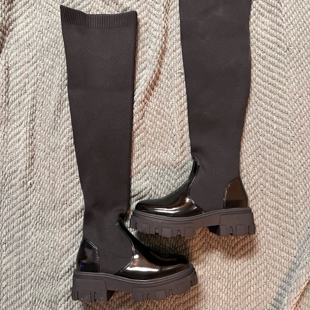 Thigh high black boots